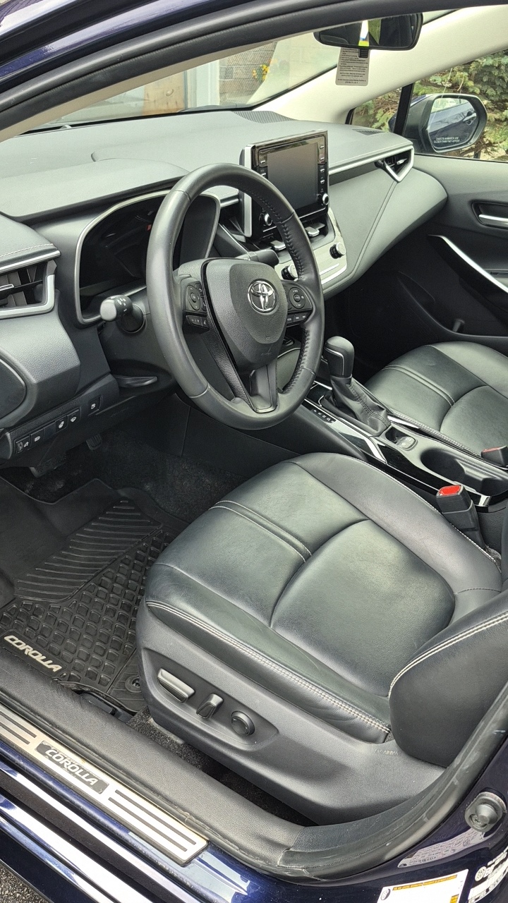 Rear seat area after detailing — clean fresh leather seats restored to like-new condition